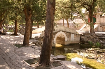 A stream runs adjacent to the Long Hall