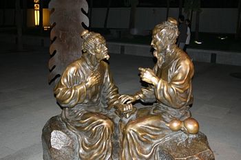 Statue of Confucius teaching a student.