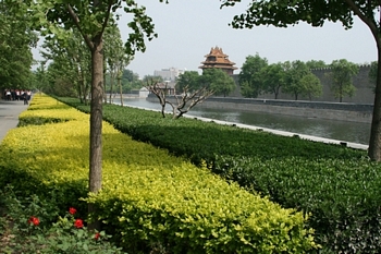 A moat surrounds three sides of the Forbidden City