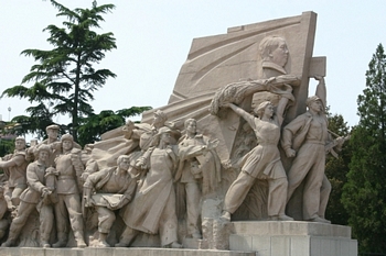 Mao's Mausoleum flanked by revolutionary statues