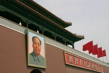 Chairman Mao looks down as you go through the first gate into 
the Forbidden City