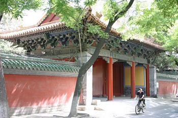 The plain enterance to the Lama Temple gives no clue to the wonders inside