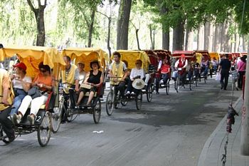 Rickshaw rides along the river.