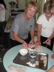 We are invited to tea and dumplings. Fran tries her hand at making a dumpling
