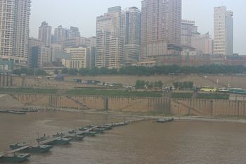Chongqing is a modern city that is hot in the summer